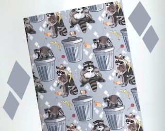 May include: A repeating pattern of raccoons and trash cans on a light blue background. The raccoons are depicted in various poses, some holding trash, some looking at the viewer, and some looking away. The trash cans are all gray and have a black lid. The pattern is repeated throughout the entire image.