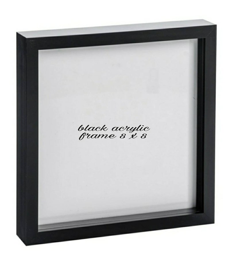 May include: Black acrylic picture frame with a white mat and a black border. The frame is 8 inches by 8 inches.