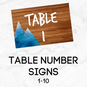 May include: Table number sign with a wooden background and blue watercolor mountains. The sign says "TABLE 1".