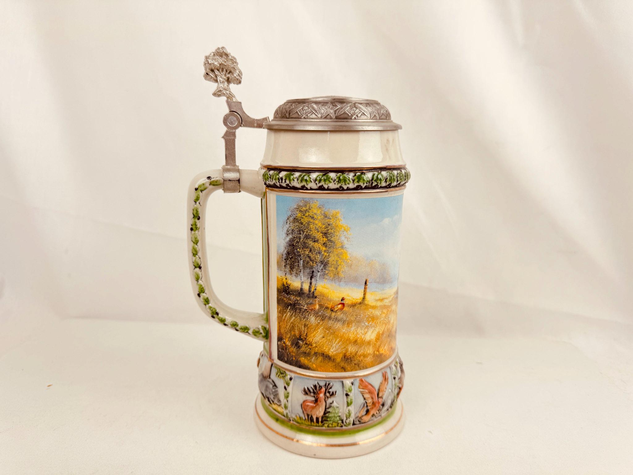 DOMEX のピューター蓋付きストーンウェアビールジョッキ、キジと野生