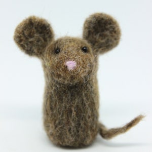 May include: A small, brown, needle-felted mouse with a pink nose. The mouse has a long tail and is looking directly at the camera.