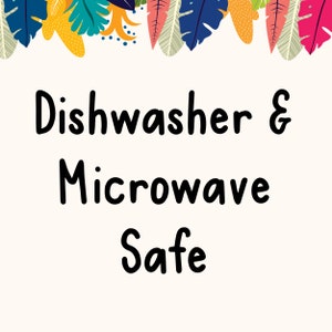 May include: A white background with a colorful border of tropical leaves. The text "Dishwasher & Microwave Safe" is written in black.