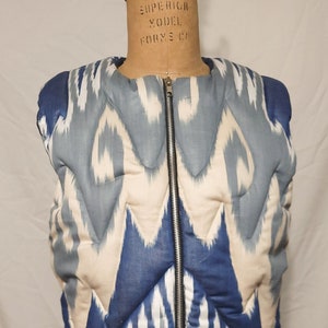 Quilted Ikat vest. Blue cream abstract print. hand woven silk and cotton from Uzbekistan