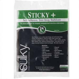 May include: A white package with a black and green label that reads "STICKY+ Self-Adhesive, Tear-Away Stabilizer". The label also includes the text "The ideal stabilizer for hooped, computerized machine embroidery" and lists various fabric types and uses for the product.