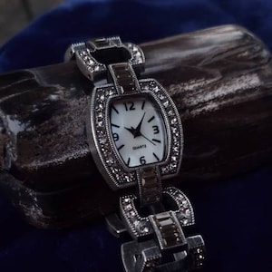 LaVintage Silvertone Black And Pewter Crystal Adornerned Link Wristwatch