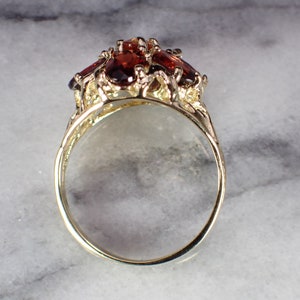ADJUSTABLE GOLD FLORAL STATEMENT RING | 80R063