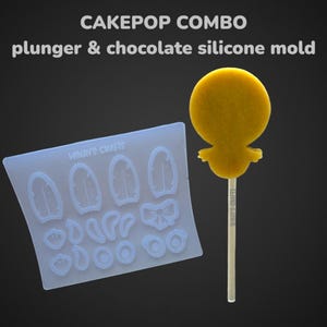 May include: A blue silicone mould with various shapes for making cake pops. The mould has a white label that says "Winway's Crafts". A yellow cake pop in the shape of a bunny is on a stick.