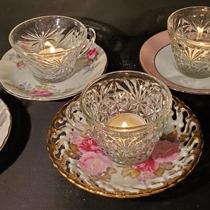 5 Mismatched Saucers with Clear Glass Tea Cups and Votive