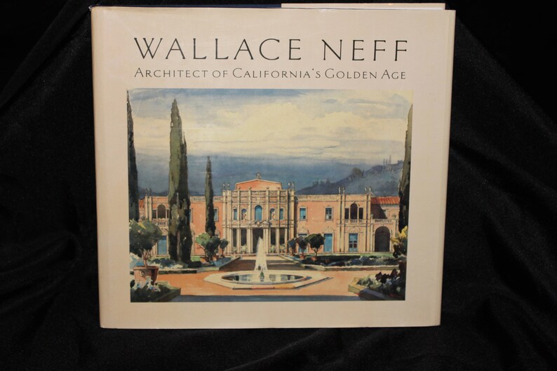 May include: A book cover with the title "Wallace Neff, Architect of California's Golden Age". The cover features a watercolor painting of a large, pink mansion with a fountain in front of it. The mansion is surrounded by lush greenery and palm trees.