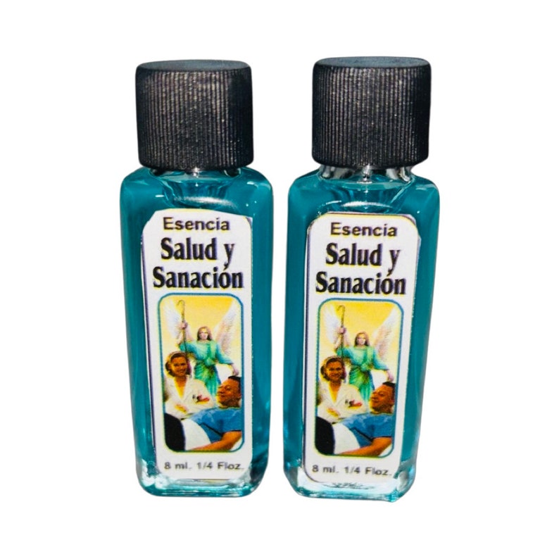 May include: Two small, rectangular glass bottles filled with blue liquid, each with a black cap. The labels read "Esencia Salud y Sanaci&oacute;n" with an illustration of angels and people. Each bottle contains 8 ml or 1/4 fl oz.