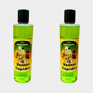 May include: Two green glass bottles with black caps and yellow labels. The labels say "Original" and "Ventas Rapidas".