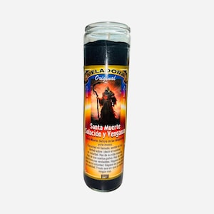 May include: A tall, cylindrical black candle in a glass jar. The candle features a colourful label with an illustration of a robed figure with a scythe. Text on the label includes "VELADORA Original" and "Santa Muerte Salación y Venganza."