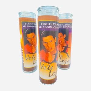 May include: Three glass candle jars with a man's face on the front. The man is pointing and has an angry expression. The text on the candle jars reads "FIXED CANDLE VELADORA COMPUESTA" and "Vete Lejo".