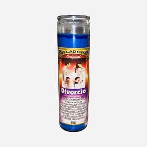 May include: A blue glass candle with the word "Divorcio" printed on the label. The label features images of people and text in Spanish. The candle is cylindrical and has a blue wax interior.