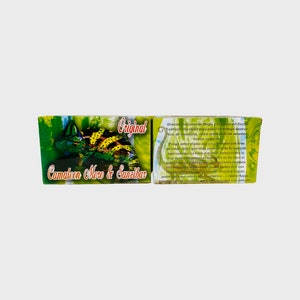 May include: A green and yellow box with a chameleon on the front. The box is labelled "Original Camaleon Moro & Sanzibar". The back of the box has text in Spanish about the product.