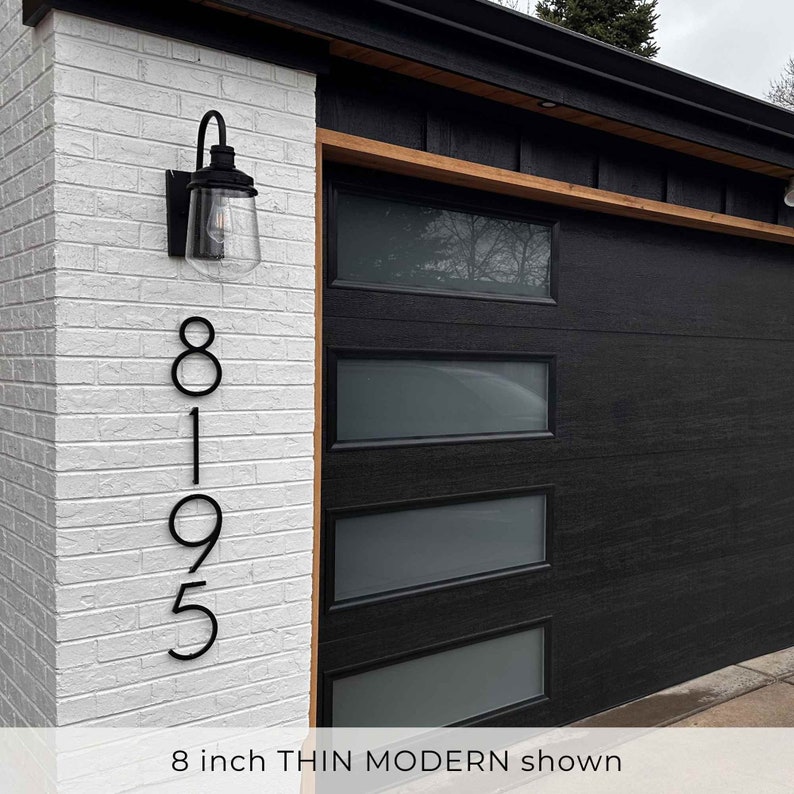 8 inch house numbers on white brick for an exterior garage renovation