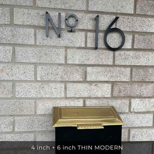 THIN MODERN 4 inch and 6 inch  black address numbers No 16 on brick above a mailbox