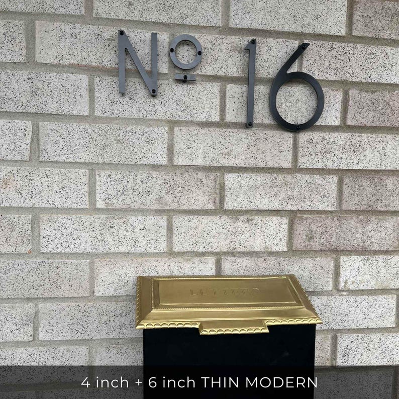 THIN MODERN 4 inch and 6 inch  black address numbers No 16 on brick above a mailbox