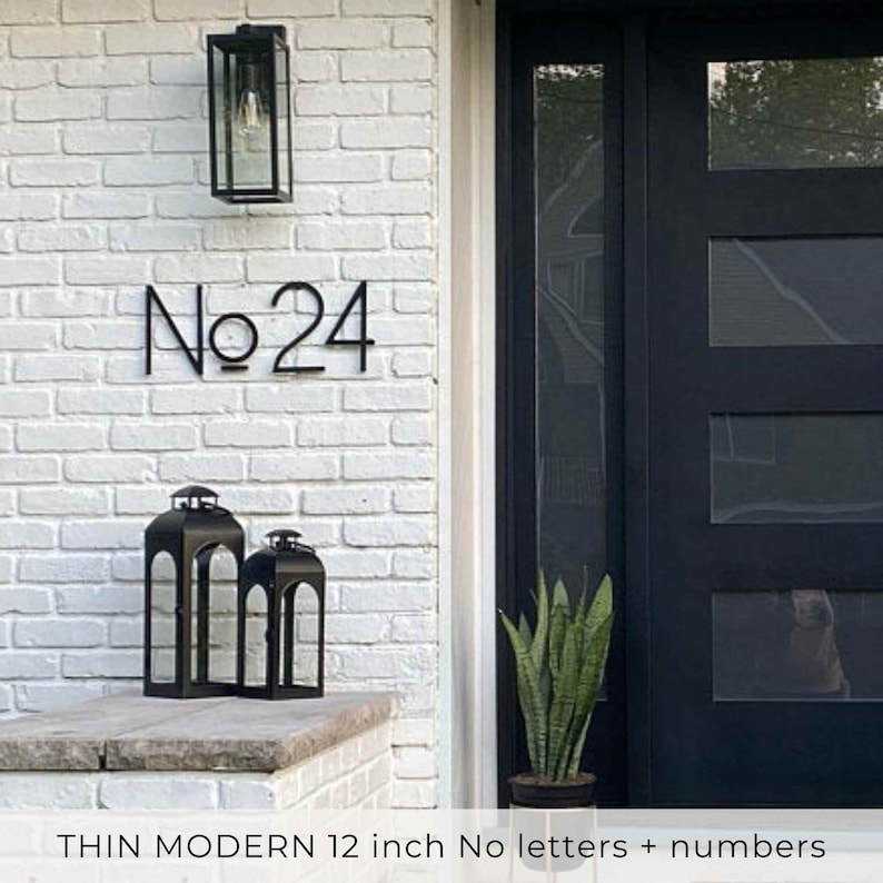 A popular address sign with curb appeal. 12 inch numbers and No letters on white brick