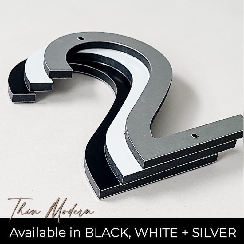 THIN MODERN house numbers are available in Black, Brushed Silver, and White colors. Each color has a separate listing in the shop.