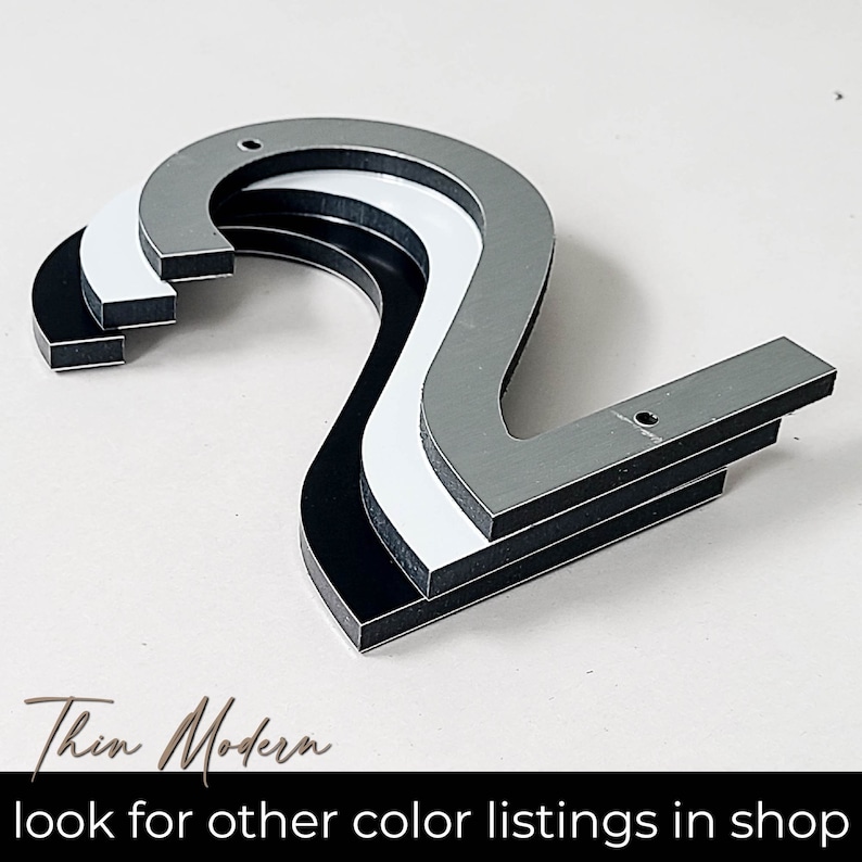 THIN MODERN house numbers are available in Black, Brushed Silver, and White colors. Each color has a separate listing in the shop.