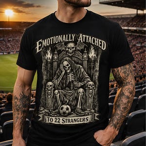 Emotionally Attached To 22 Strangers gothic football fan shirt featuring a frustrated skeleton sitting on a throne with a soccer ball, dark humor sports tee, gothic soccer shirt, vintage skeleton artwork, football lover gift, alternative fashion, dark academia style, soccer supporter apparel, unique football fan clothing, match day shirt, gothic sports design, unisex football t shirt.