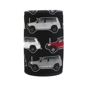 May include: Black neoprene can cooler with a repeating pattern of white, red, and grey SUVs.