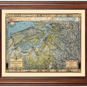 May include: A vintage map of the Puget Sound region in Washington state, featuring a detailed illustration of the waterways, islands, and surrounding landscape. The map is framed in a brown wooden frame and has a cream-colored mat.