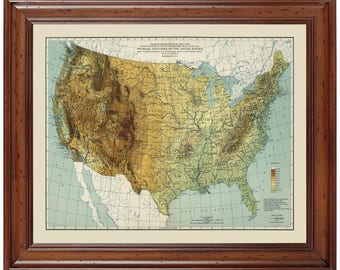 May include: A vintage map of the United States showing physical features, including elevation, rivers, and coastlines. The map is in a brown wooden frame. The title of the map is "Physical Features of the United States".