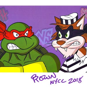 May include: A green Teenage Mutant Ninja Turtle with a red bandana and a yellow shell is facing a white cat with a black mask and a striped shirt. The cat has a sailor hat on. The background is purple with the words "Raph" and "Scratch" in white. The words "VS" are in the middle of the image. The image is signed "Brown NYCC 2018 20/20".