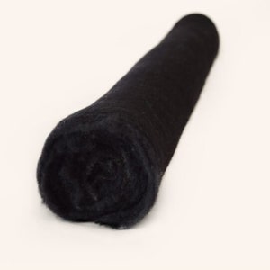 May include: A roll of black felt fabric.
