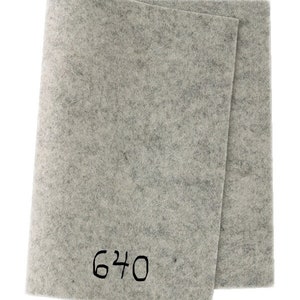 May include: A sheet of grey felt with the number 6240 printed on it.