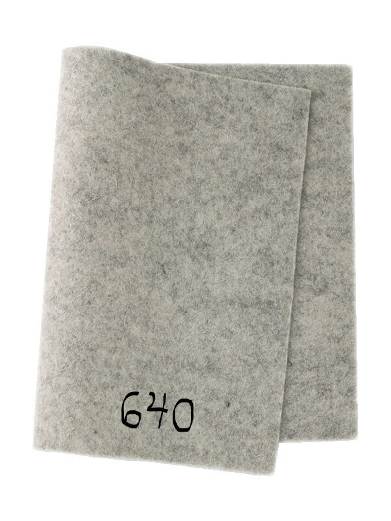 May include: A sheet of grey felt with the number 6240 printed on it.