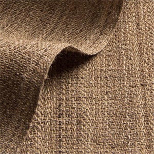 May include: Close-up of a brown woven fabric with a textured surface. The fabric has a natural, rustic look and feel.