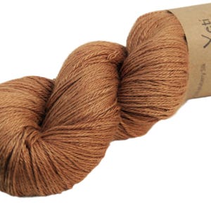 yak and silk yarn yeti dyed light brown with black walnut shells