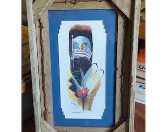 Lámina enmarcada "American Spirit" con la bandera y plumas de águila, firmada a mano por Janet LeRoy en 2003.