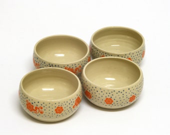 Set of 4 ceramic bowls with creamy color, orange flowers with scattered blue dots. Handmade gift.
