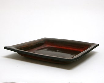 Pottery handmade, dark red and brown glossy ceramic plate. Home gift.