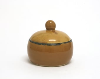 Ceramic round box with a lid. Honey-brown and blue-grey hues. Use it for various foods or for storing precious belongings. Handmade gift.