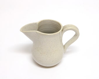 Decorative ceramic white vase/jug with a special design for your living room, dining room or kitchen. Handmade gift.