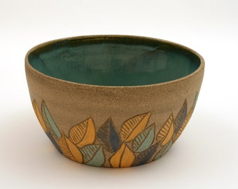 Pottery handmade, ceramic bowl with a special leaves design. Will have an amazing look in any room. Perfect gift.