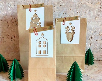 Calendario dell’Avvento 24 pezzi buste carta kraft con tag di natale bianchi in cartoncino traforato