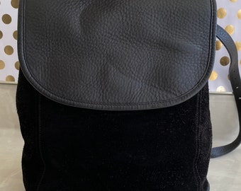 light blue coach backpack