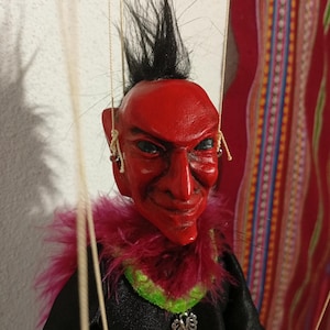 Tamash the Apache demon, a manipulable string puppet.
