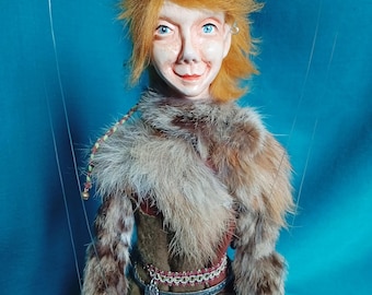 Aldaron, the princely elf lord of the trees, a manipulable string puppet