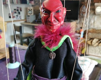 Tamash the Apache demon, manipulable string puppet.