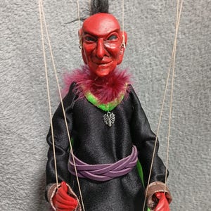 Tamash the Apache demon, a manipulable string puppet.