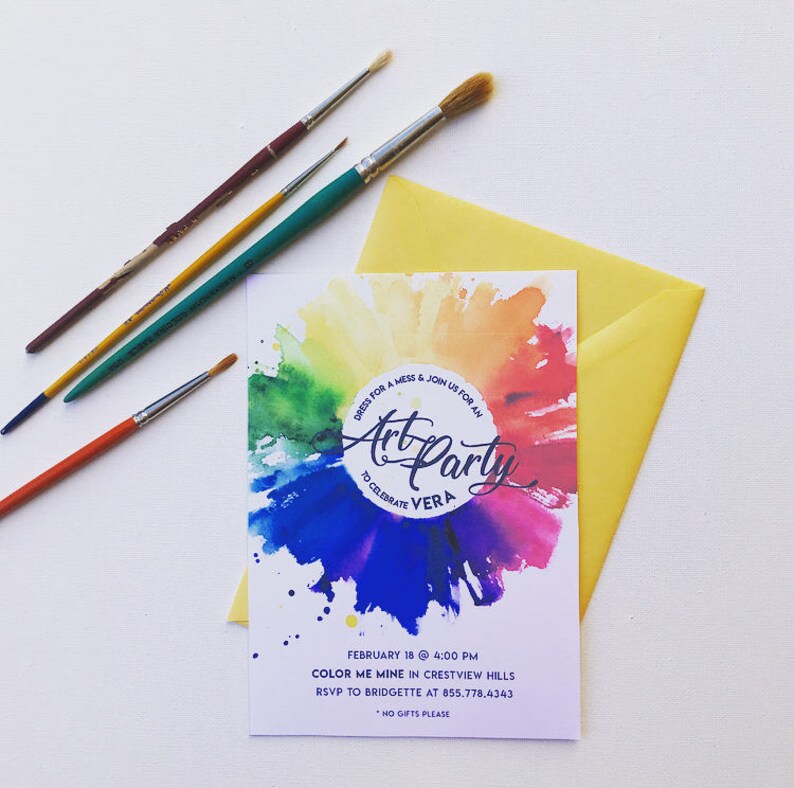 May include: A colorful invitation to an art party for Vera. The invitation features a watercolor design with a rainbow color scheme and the text "Dress for a mess & join us for an Art Party to celebrate Vera". The invitation also includes the date, time, location, and RSVP information.