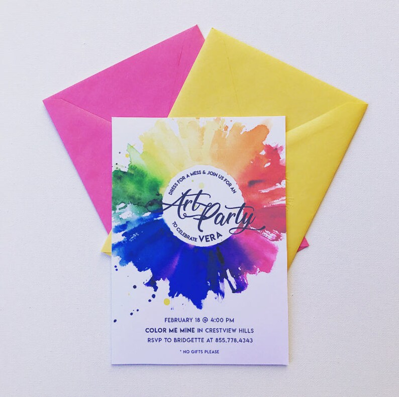 May include: Invitation to an art party for Vera. The invitation features a colorful watercolor background with a circle that says "Art Party to Celebrate Vera". The text on the invitation says "Dress for a mess & join us for an Art Party to Celebrate Vera. February 18 @ 4:00 PM. Color Me Mine in Crestview Hills. RSVP to Bridgette at 855.778.4343. *No gifts please."