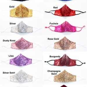 May include: Twelve different colors of sequined face masks with adjustable ear loops. The colors are black, royal blue, gold, red, silver, fuchsia, dusty rose, rose gold, lilac, burgundy, silver swirl, and champagne swirl. The masks are shown with a white filter insert. The text "Filters Available" and "Filter Inserts" are also shown.